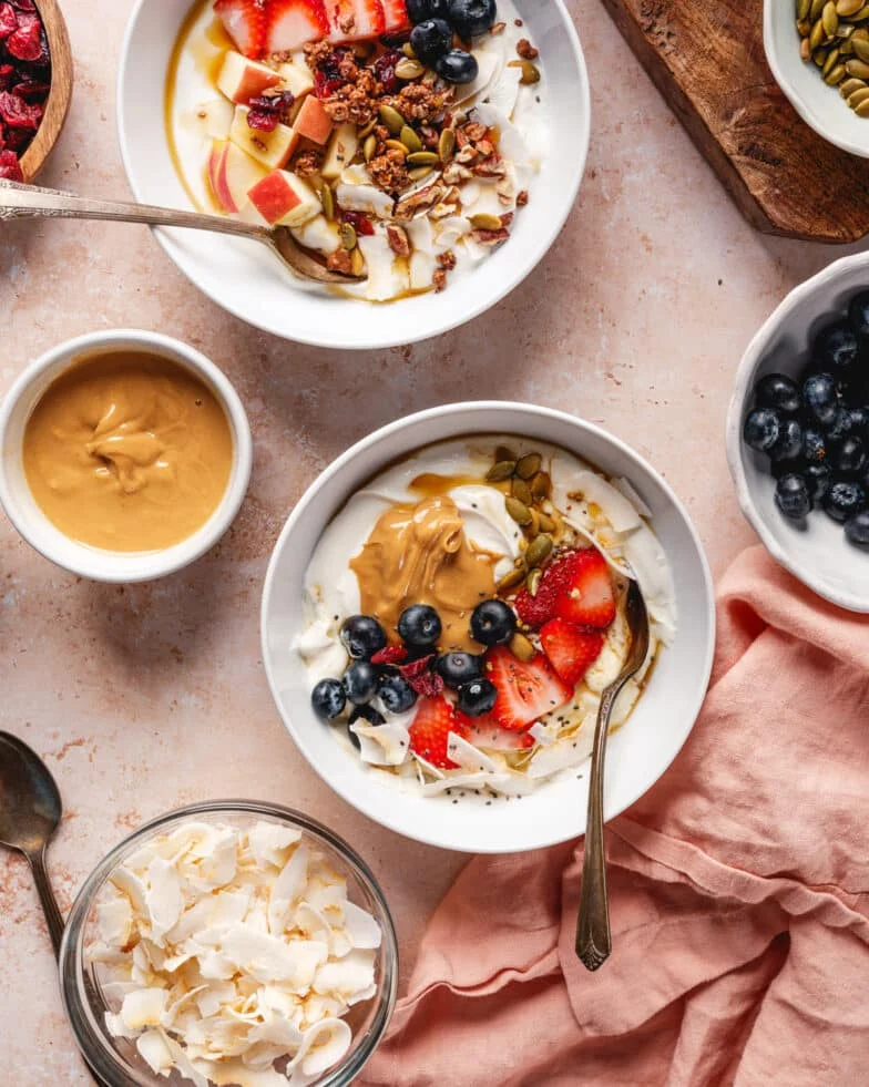 Mediterranean diet breakfast bowl with Greek yogurt, fresh figs, walnuts, and olive oil toast